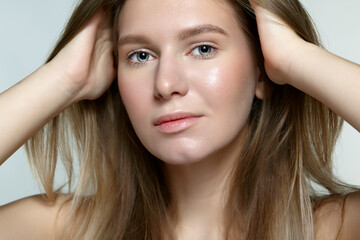 Fototapeta premium Portrait of young blonde woman.