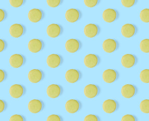 macarons seamless pattern. macarons isolated on blue background.