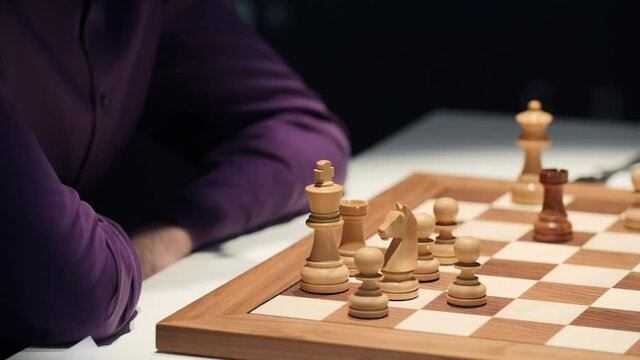 A chess player making his next chess move, Stock image