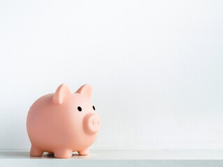 Cute piggy bank, pink color isolated on white background.