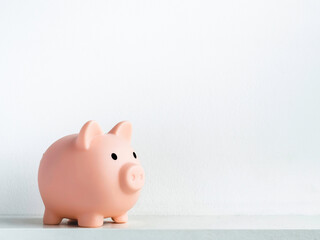 Cute piggy bank, pink color isolated on white background.