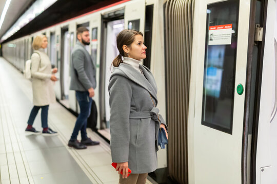 Passengers enter subway cars. High quality photo