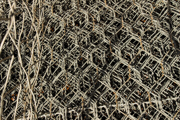 Plenty of iron fence material stacked
