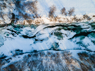 Abstract Top Down Drone View on Frozen Ice COvered River