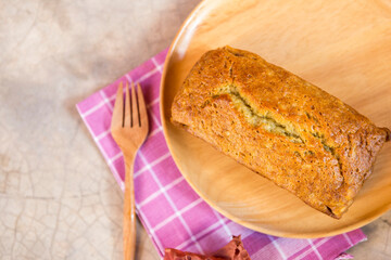 Banana bread on wooden tray, home made bread, ultra-moist healthy banana bread
