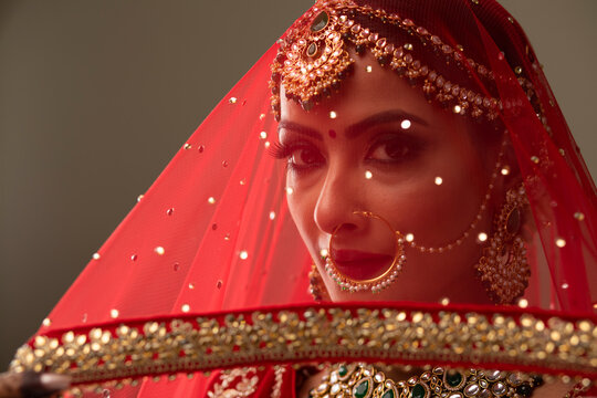 Beautiful Indian Bride, with a veil.	