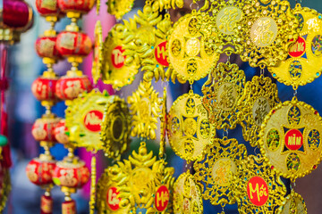 Decoration item for Lunar new year with text Happy new year in Vietnamese and wishes of all the best TEXT TRANSLATION from Vietnamese: Congratulations on the Vietnamese, Chinese New Years and wishes