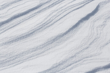 Fototapeta na wymiar Natural snowy background. Natural snowy surface.