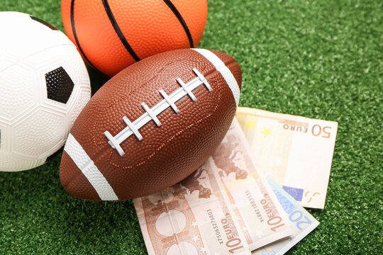 Money and balls on color background. Concept of sports bet