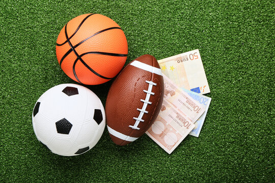 Money and balls on color background. Concept of sports bet