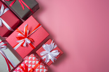 Gift boxs with bow on pink background top view, Valentines day, Flat lay style with copy space.