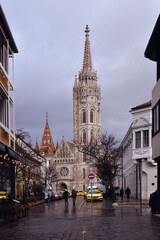 Obraz premium White gothic church on the streets of the old town