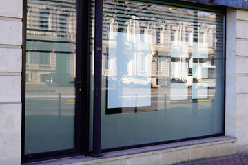 Silver Black aluminium window facade shop and empty blank panel on frontstore