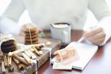 Winter breakfast. A cup of hot chocolate with marshmallows and freshly baked cookies. Gingerbread cookie and coffee.