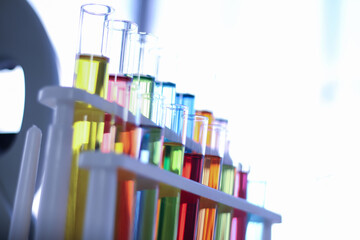 A test tube with colorful water inside the tube