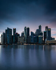 Singapore city skyline at night blue hour
