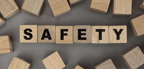 The word SAFETY made from wooden cubes. Conceptual photo