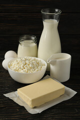 Different fresh dairy products on wooden background