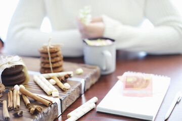 Winter breakfast. A cup of hot chocolate with marshmallows and freshly baked cookies. Gingerbread cookie and coffee.