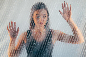 Woman protection. Defocused portrait. Self isolation. Female discrimination. Hopeless lady in black...