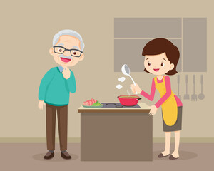 elderly man looking to lovely woman cooking in kitchen