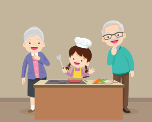 elderly happy looking at child girl cooking in kitchen