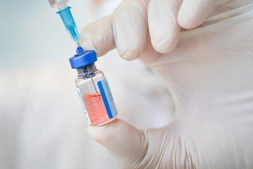 Syringe, medical injection, bottle, ampule in hand, palm or fingers. Medicine plastic vaccination...