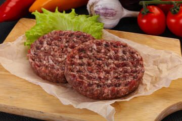 Raw burger cutlet