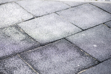 Cement brick squared stone floor background. Concrete paving slabs. Paving slabs