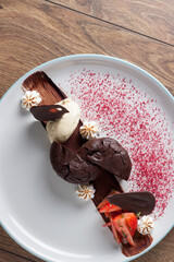 Chocolate brownie with strawberries