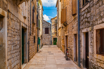 Fototapeta na wymiar Old streets at Stari Grad, a town at Hvar island, Croatia