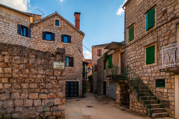 Fototapeta na wymiar Old streets at Stari Grad, a town at Hvar island, Croatia