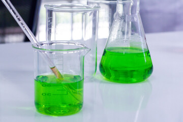 A test tube with colorful water inside the tube