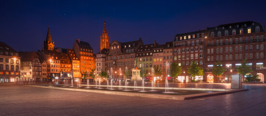 Strasbourg, evening in Place Kleber square. Cathedral on background. Alsace, France