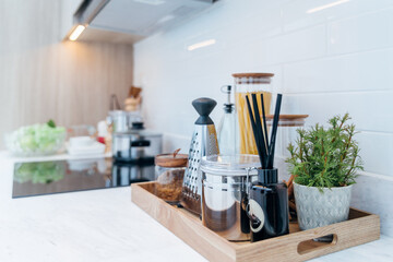 A clean and sanitized kitchen with some tools for cooking.