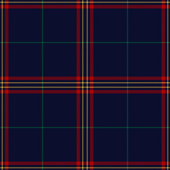 Christmas plaid in blue, red, green, yellow. Seamless dark tartan checked plaid background for blanket, tablecloth, throw, duvet cover, flannel shirt, or other modern winter holiday textile print.