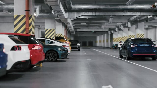 Underground parking with cars. Modern underground parking. Indoor full modern parking. 3d visualization