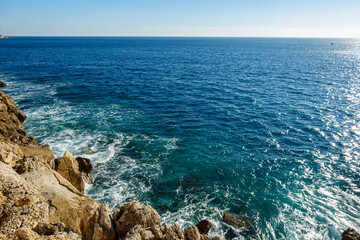 waves crashing on rocks