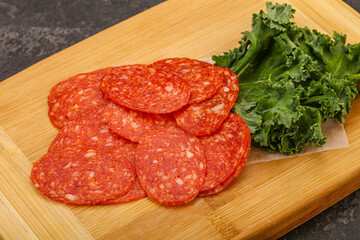 Italian spycy pepperoni sausage slices