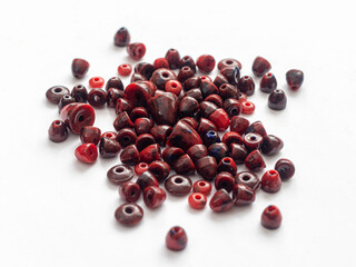 Red coral beads isolated on white background