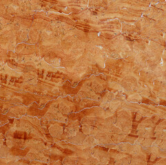 Bright orange marble background. Natural stone surface texture wall