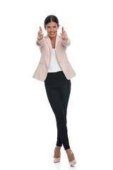 happy smart casual girl smiling and pointing fingers