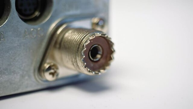 Connecting a coaxial cable to radio equipment close-up