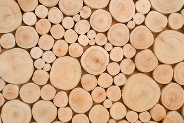 pile of naturial log round teak wood tree stump texture background pattern use for interior wall...