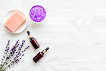 Obraz na płótnie Canvas Flat lay of spa lavender treatments - cosmetic pharmacy products