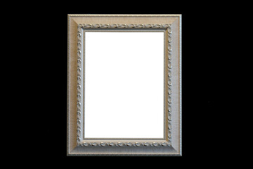 Silver classic and vintage picture frame isolated on black background.