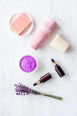 Fototapeta na wymiar Set lavender cosmetic pharmacy products with essential oil and sea salt