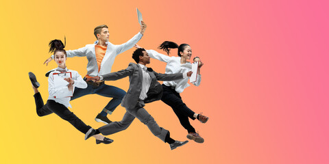 Sunset. Happy office workers jumping and dancing in casual clothes or suit isolated on gradient neon fluid background. Business, start-up, working open-space, motion, action concept. Creative collage.
