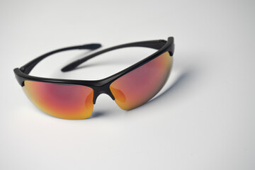 Sports sunglasses close-up on white background