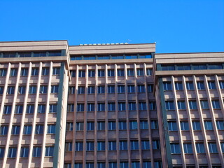 Genova, Italy - January 25, 2021: Modern construction in the city center of Genova, beautiful high skylines with grey and blue sky in the background in winter.